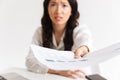 Blurry photo of tense asian woman employee with long dark hair h Royalty Free Stock Photo