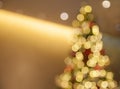 Blurry red Christmas balls on artificial Christmas tree.Christmas Holiday Blurred Background. Royalty Free Stock Photo