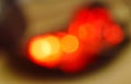 Blurry red electric light bulb background and texture