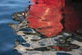 Blurry reflection of red boat bow Royalty Free Stock Photo