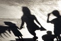 Blurry shadow silhouette of a family walking  on a summer day Royalty Free Stock Photo