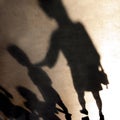 Blurry shadows silhouettes of people on summer promenade Royalty Free Stock Photo