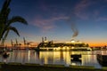 Blurry silhouette of Cruise ship \'Viking Venus\' in port on sunset in Malaga