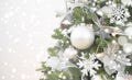 Blurry sparkling Christmas background and decorated fir tree with copyspace