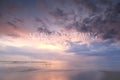 Blurry sunset on the beach with Inspirational quote - Never stop dreaming Royalty Free Stock Photo