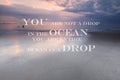 Blurry sunset on the beach with Inspirational quote You are not a drop in the ocean you are entire ocean in a drop Royalty Free Stock Photo