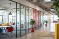 Blurry view of modern office space with glass doors Royalty Free Stock Photo