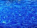 blurry water rippled in swimming pool