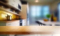 A blurry workplace in the kitchen with an empty wooden countertop in front of, generative AI Royalty Free Stock Photo