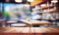 A blurry workplace in the kitchen with an empty wooden countertop in front of, generative AI Royalty Free Stock Photo