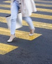 Blurry young woman on zebra crossing