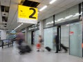 Blury passenger or tourist at the arrival terminal 2 of Amsterdam Airport Royalty Free Stock Photo