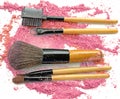 Blushes make up set on crushed cosmetic powder.