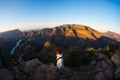 Blyde River Canyon, famous travel destination in South Africa. Tourist looking at panorama at sunset. Last sunlight on the