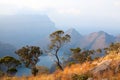 Blyde River Canyon, three green trees, blue lake and mountains in the clouds in sunset light background, South Africa Royalty Free Stock Photo