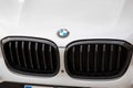 BMW car logo grill close up sign text brand front suv white car exterior detail
