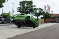 BMW car rides sideways on two wheels, at an auto show in the city of Halle Saale, Germany, 04.082019