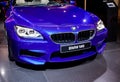 BMW company logo on blue car