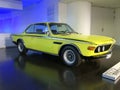 1972 BMW 3.0 CSL or E9, car side view, yellow color.