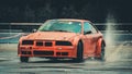 BMW drift car performs with rain Royalty Free Stock Photo