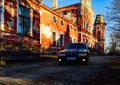 Bmw e39 and old building. Royalty Free Stock Photo