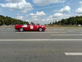 BMW E30 3-series cabriolet car drive on street during retro-cruise