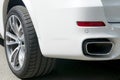 BMW F15 X5 M Perfomance. Tire and alloy wheel. Side view of a white modern luxury car Royalty Free Stock Photo