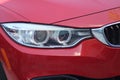BMW front passenger headlight Royalty Free Stock Photo