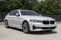 BMW 530i display at a dealership. BMW offers the 530i in Sedan or xDrive Sedan models Royalty Free Stock Photo