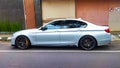 Surakarta Indonesia March 5 2022 BMW 530i G30 with M performance package parked on the side of the road Royalty Free Stock Photo