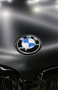 BMW logo on the hood of the car is black. Close-up, top view. Royalty Free Stock Photo