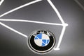 BMW logo on the hood of the car is gray. The nameplate of the car. Royalty Free Stock Photo