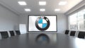 BMW logo on the screen in a meeting room. Editorial 3D rendering Royalty Free Stock Photo
