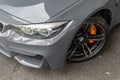 BMW M4 Gray headlight and wheel view