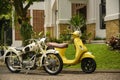 BMW Oldtimer, Old vintage motorbike. German Heavy Motorcycle During The Second World War. and Yellow Vintage Vespa Motorcycle Royalty Free Stock Photo