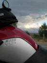 BMW R1200GS petrol tank view, after a rain storm.