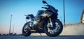 BMW S1000rr Motorcycle in carpark at sunset Royalty Free Stock Photo
