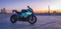 BMW S1000rr Motorcycle in empty carpark at sunset glowing Royalty Free Stock Photo