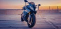 BMW S1000rr Motorcycle in carpark at sunset Royalty Free Stock Photo