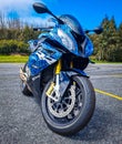 BMW S1000rr Motorcycle in empty carpark in a mountain forest Royalty Free Stock Photo