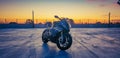 BMW S1000rr Motorcycle in empty carpark at sunset Royalty Free Stock Photo