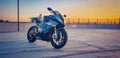 BMW S1000rr Motorcycle in empty carpark at sunset Royalty Free Stock Photo