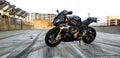 BMW S1000rr Motorcycle in empty carpark at sunset Royalty Free Stock Photo