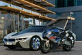 BMW S1000RR motorcycle versus BMW I8 electric sports coupe