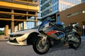 BMW S1000RR motorcycle versus BMW I8 electric sports coupe