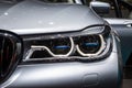 BMW 7-series car headlight Royalty Free Stock Photo