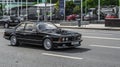 BMW 6 Series E24 driving on the street. Black BMW 630 CS 1979 year model in motion, front side view Royalty Free Stock Photo