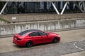 BMW 5 series F10 car is parked near office building Royalty Free Stock Photo