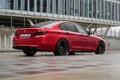 BMW 5 series F10 car is parked near office building Royalty Free Stock Photo