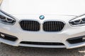 BMW sign logo and brand text on white car hood german vehicle Royalty Free Stock Photo